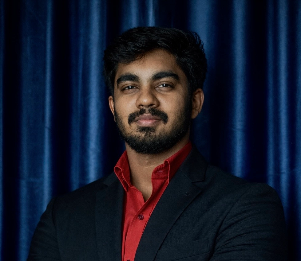 Digital marketer standing confidently in a professional suit.